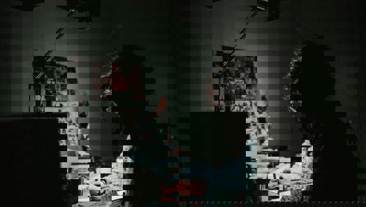 worker drawing on a piece of paper