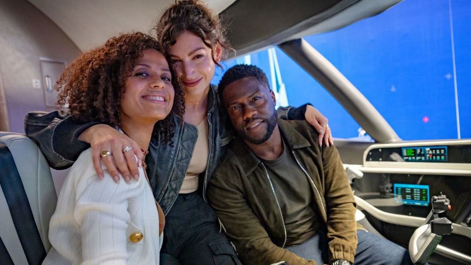 Gugu Mbatha Raw As Abby, Úrsula Corberó As Camila And Kevin Hart As Cyrus smiling for the camera on the set of lift