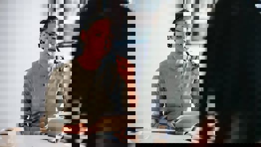 woman listening attentively to a colleague