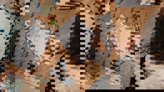 office worker writing on a notepad