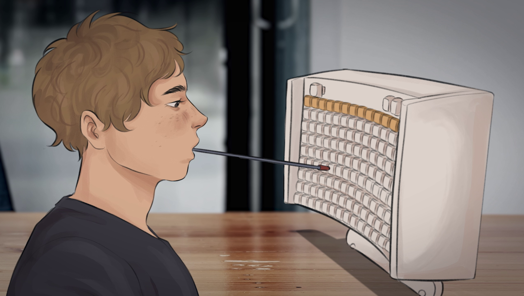 Person with disability typing on a keyboard with a tool held with their mouth